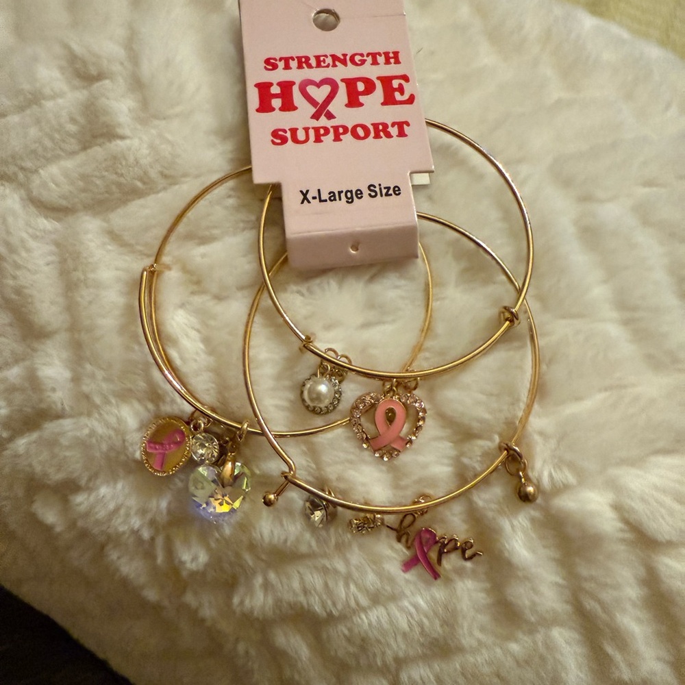Gold and Pink Charm Bracelets